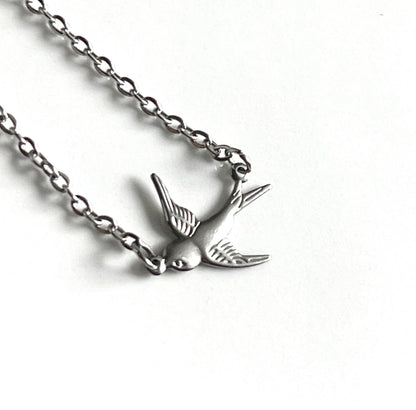 Sparrow Bird Charm Necklace. Glass Vial Display